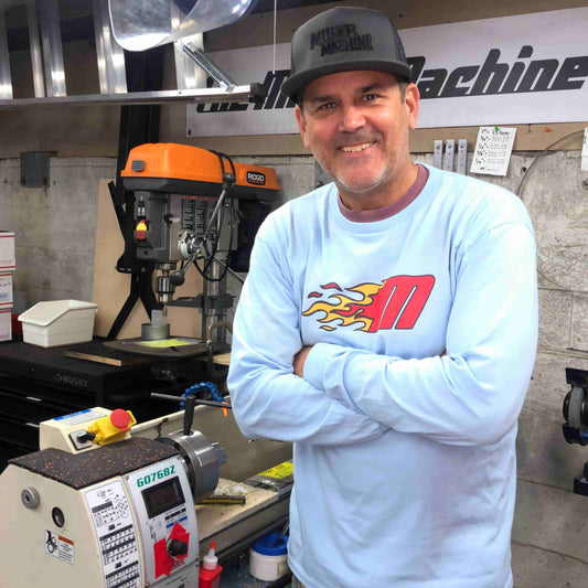 Photo of Billy Miller in his Miller Machine workshop in Seattle, Washington.