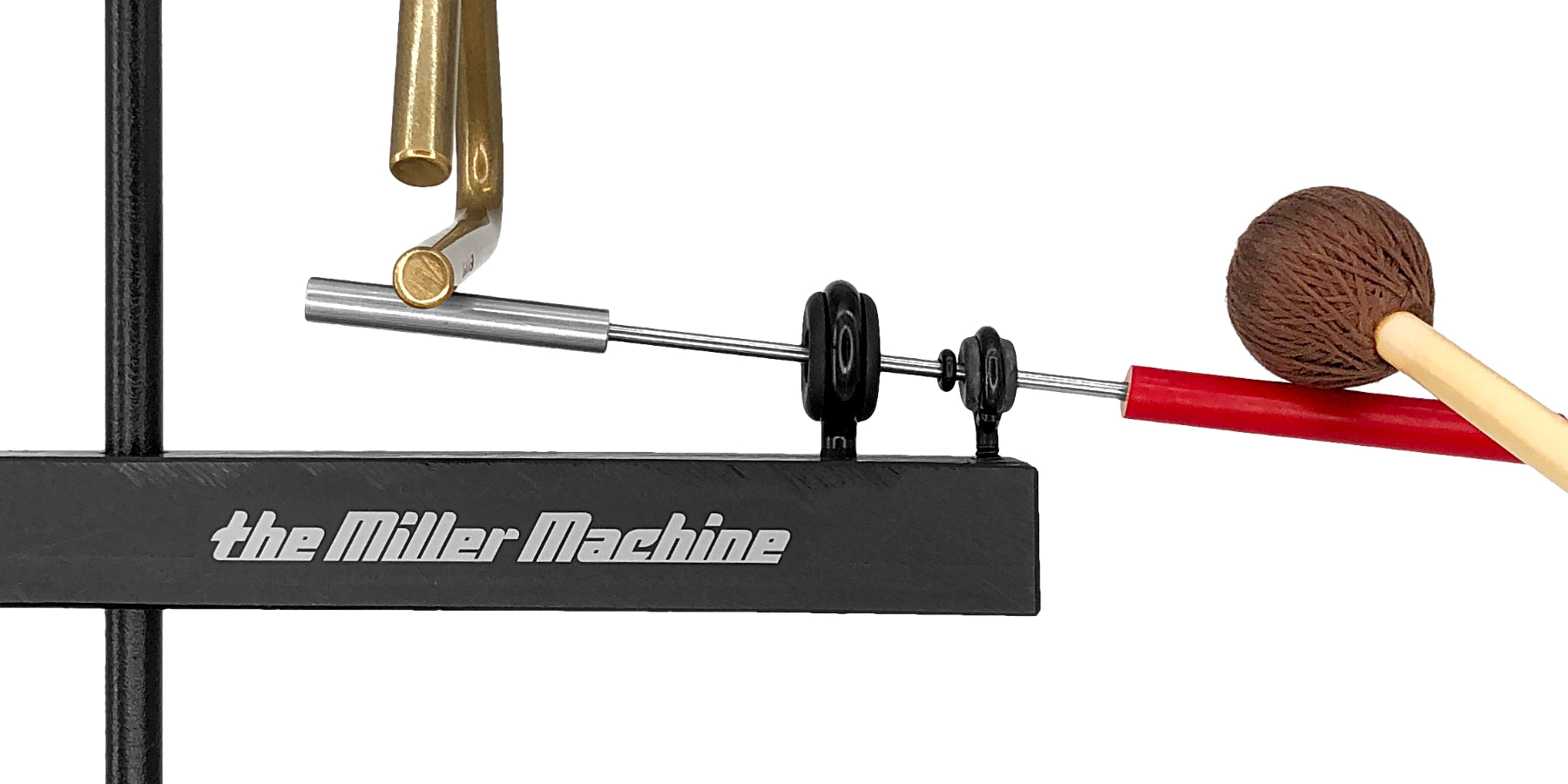 Photo of The Miller Machine, Triangle Machine with new custom steel beater, being played with a brown yarn mallet.