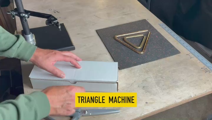 Load video: video showing how The Miller Machine, Triangle Machine Plus is unboxed and setup.